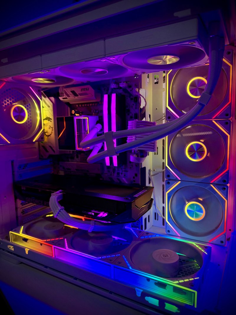 Gaming PC with rainbow RGB fans and illuminated cables