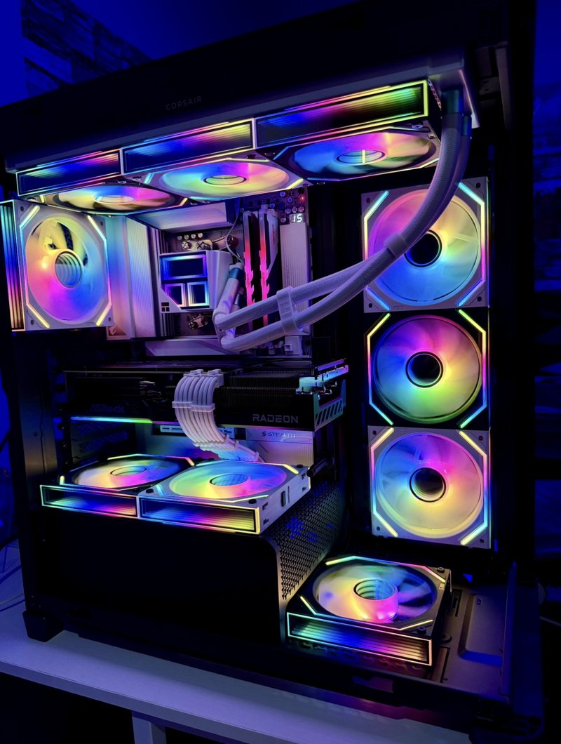 Gaming PC with rainbow RGB fans, illuminated memory and a liquid cooler