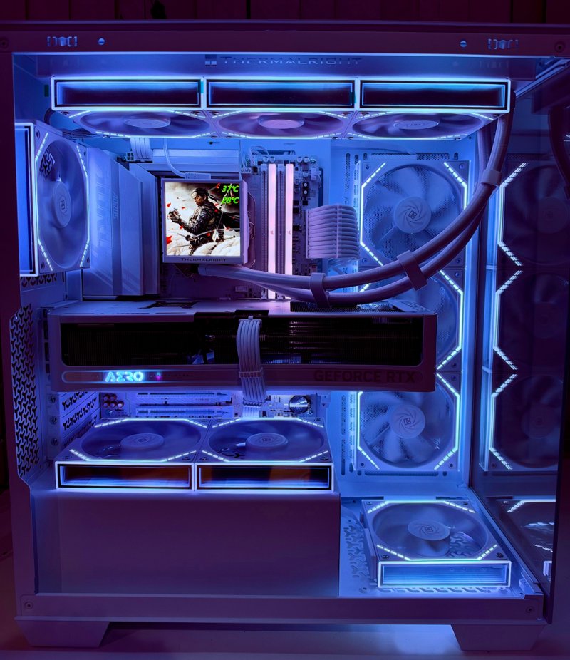 Gaming PC with blue lighting, a cooler display and illuminated memory